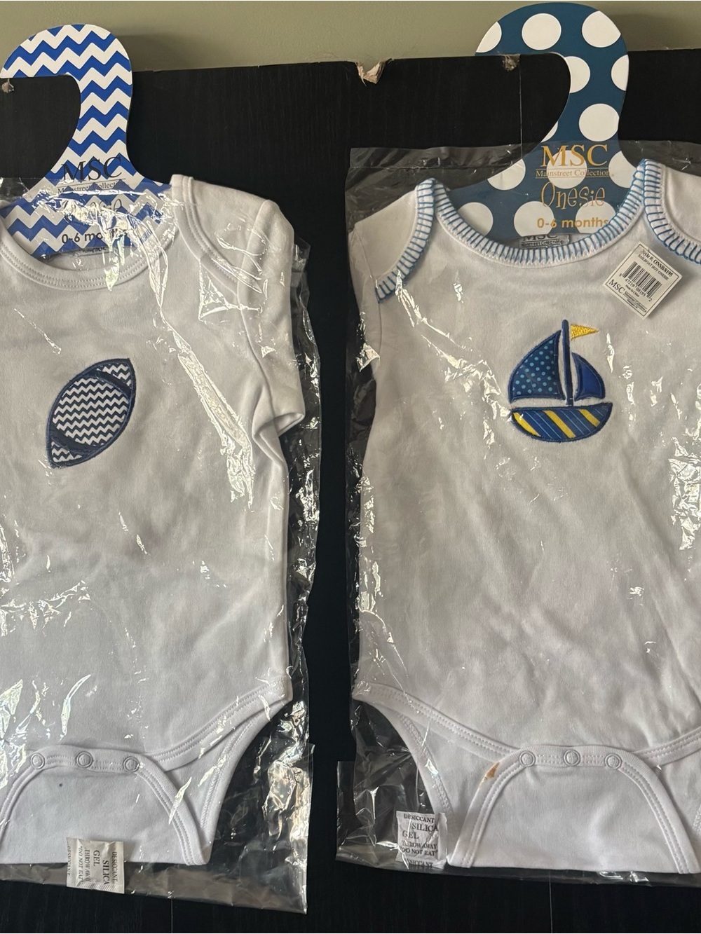 White Baby One-Piece with Blue Sailboat Applique